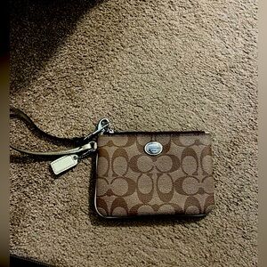 Coach brown/gold wristlet